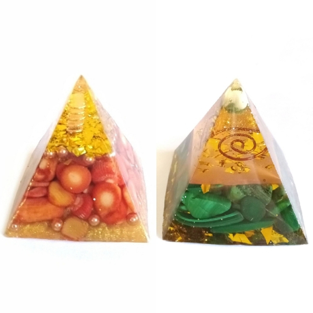 Set of copper and quartz Orgonite pyramids with red coral and green malachite